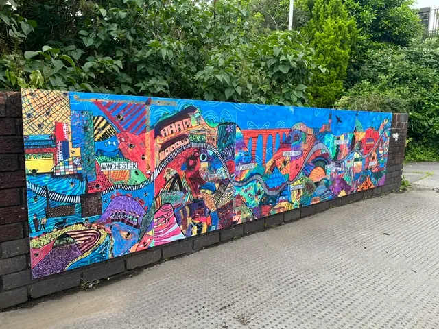 a mural on a station platform